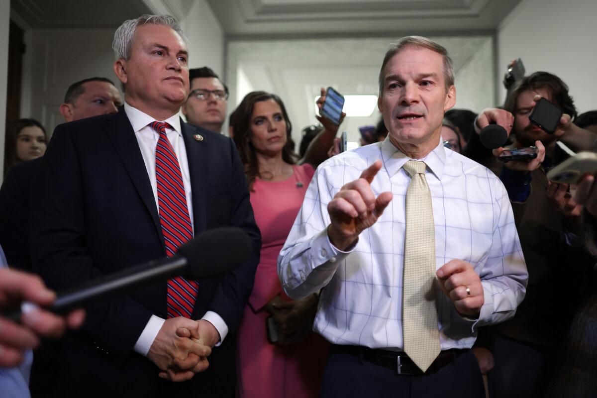House Oversight Chairman James Comer (R-Ky.) (L) and House Judiciary Chairman Jim Jordan (R-Ohio) talk to reporters after President Joe Biden's son Hunter Biden defied a subpoena, in the Rayburn House Office Building in Washington on Dec. 13, 2023. (Alex Wong/Getty Images)