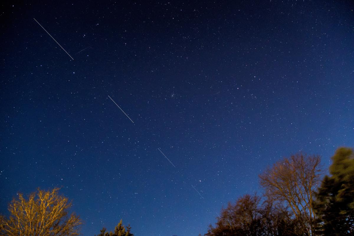SpaceX Starlink 5 satellites in the sky as seen from Svendborg on South Funen, Denmark, on April 21, 2020. (Ritzau Scanpix/Mads Claus Rasmussen via Reuters)