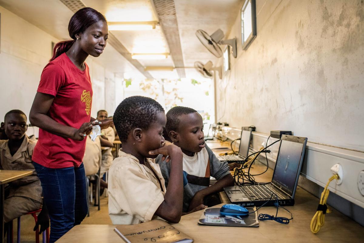 Schoolchildren from Avrankou-Houeze school attend a class at City Hall in Avrankou, Benin, on Jan. 18, 2019. (Yanick Folly/AFP via Getty Images)