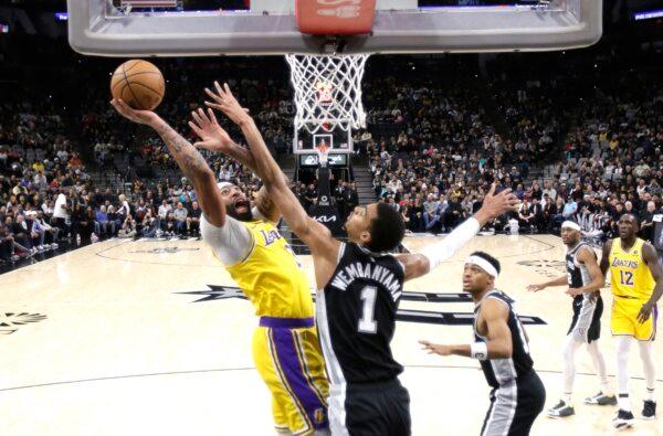 Anthony Davis (3) of the Los Angeles Lakers shoots over Victor Wembanyama (1) of the San Antonio Spurs in the first half at Frost Bank Center on Dec. 13, 2023. (Ronald Cortes/Getty Images)