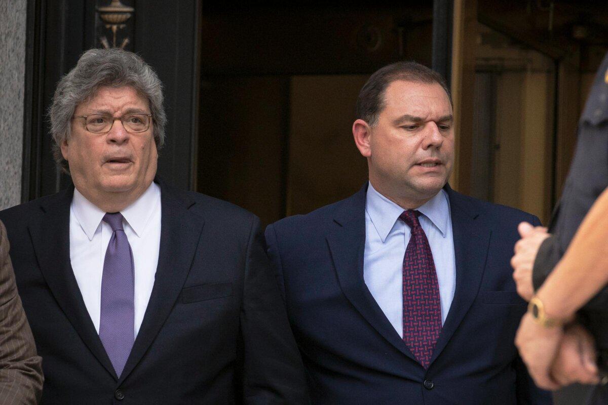 Joe Percoco (R), former top aide to New York Gov. Andrew Cuomo, leaves federal court after being sentenced to six years in prison for corruption charges, in New York City, on Sept. 20, 2018. (Drew Angerer/Getty Images)