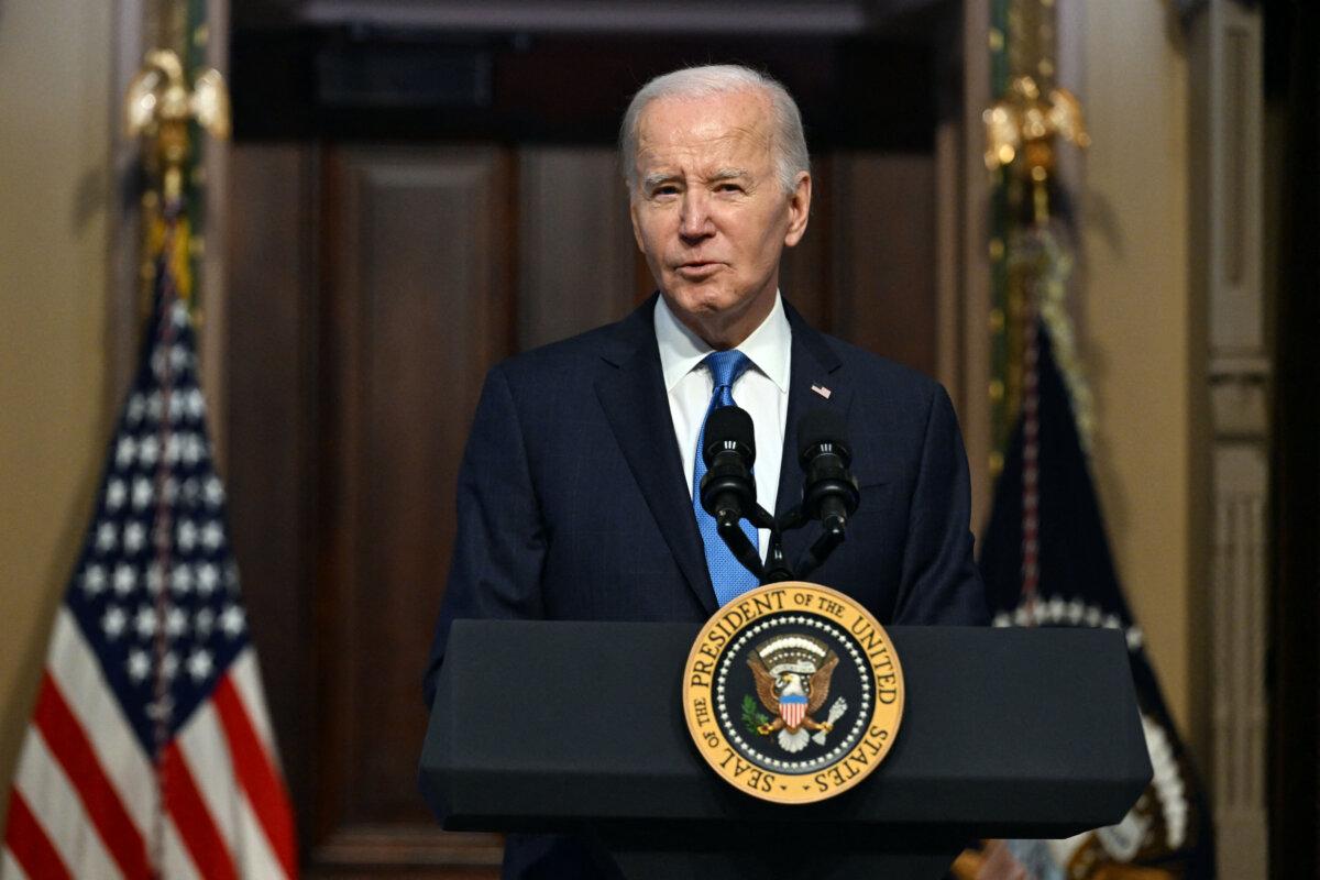 President Joe Biden speaks at a meeting of the National Infrastructure Advisory Council, in the Indian Treaty Room of the White House in Washington on Dec. 13, 2023. (Jim Watson/AFP via Getty Images)