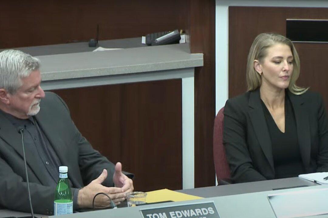 Sarasota County School Board members Tom Edwards and Bridget Ziegler are seen at a board meeting on Dec. 12, 2023. (Sarasota County School Board/Screenshot via Youtube)