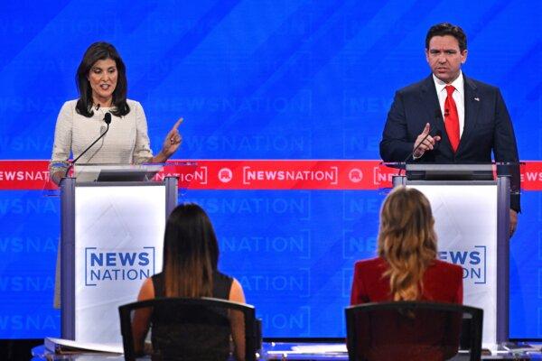 Florida Governor Ron DeSantis (R) and former Governor from South Carolina and UN ambassador Nikki Haley gesture as they speak during the fourth Republican presidential primary debate at the University of Alabama in Tuscaloosa, on Dec. 6, 2023. (Jim Watson/AFP via Getty Images)