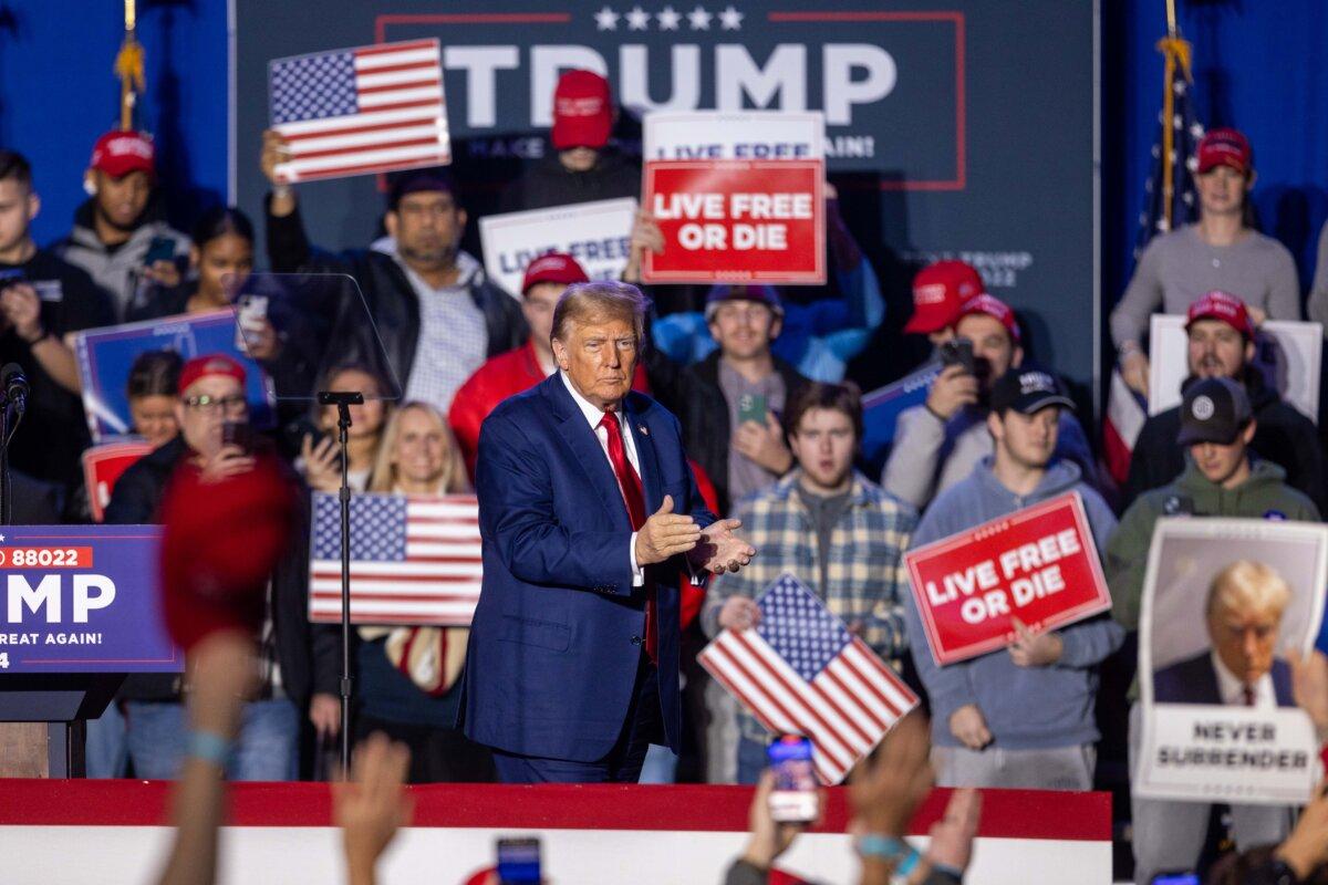 Republican presidential candidate former President Donald Trump claps during a campaign event at the Whittemore Center Arena in Durham, N.H., on Dec. 16, 2023. (Scott Eisen/Getty Images)