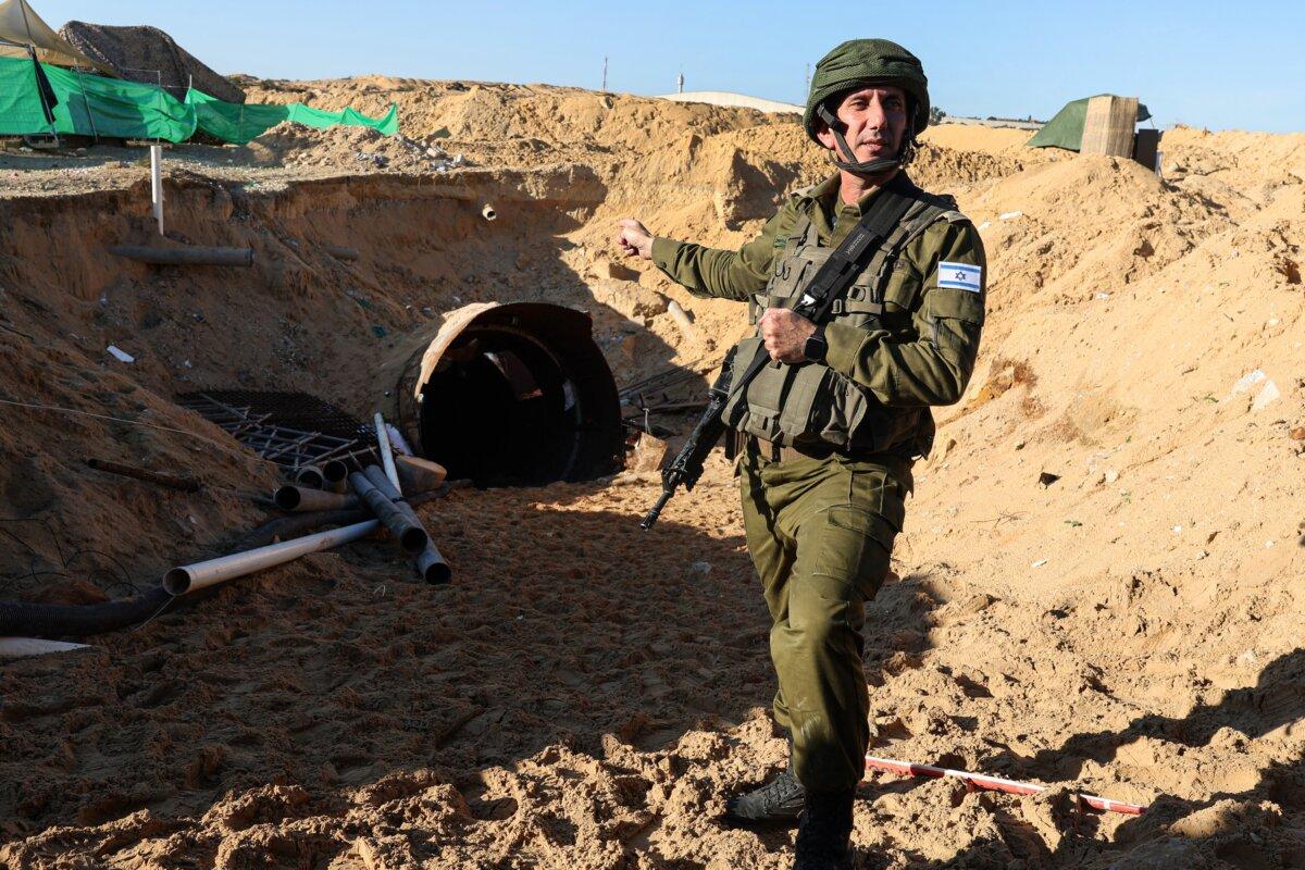 IDF spokesman Rear Adm. Daniel Hagari describes for the press a tunnel used by Hamas in the Oct. 7 terror attack, frequently visits ADI Negev because his brother Yoni is its longest-tenured resident, on Dec. 15, 2023. (Jack Guez/AFP via Getty Images)