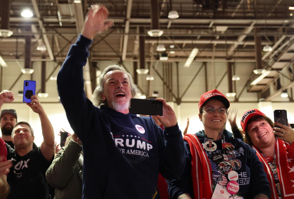 Supporters cheer as Republican presidential candidate former U.S. President Donald Trump delivers remarks during a campaign rally at the Reno-Sparks Convention Center in Reno, Nev., on Dec. 17, 2023. (Justin Sullivan/Getty Images)