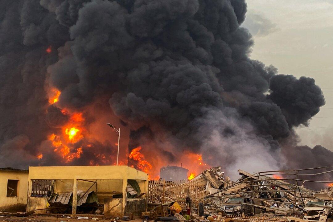 Guinea Oil Terminal Blast Kills at Least 13, Fire Largely Contained