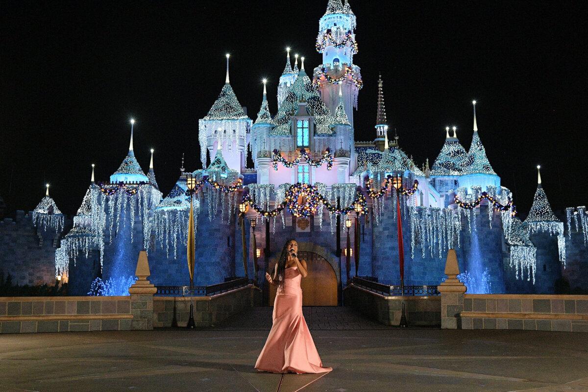 Ariana DeBose, who voices the character Asha, surprises guests with a performance from "Wish" at Disneyland in Anaheim, Calif., on Nov. 11, 2023. (Charley Gallay/Getty Images for Disney)