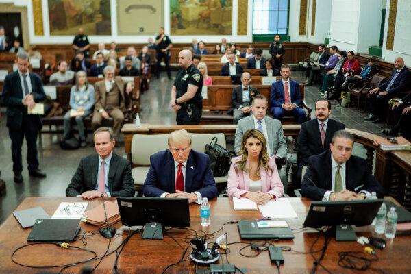 Former President Donald Trump sits at the defense table with his attorneys Christopher Kise (L) and Alina Habba (2nd-R) in the New York State Supreme Court in New York City on Dec. 7, 2023. (Eduardo Munoz Alvarez-Pool/Getty Images)