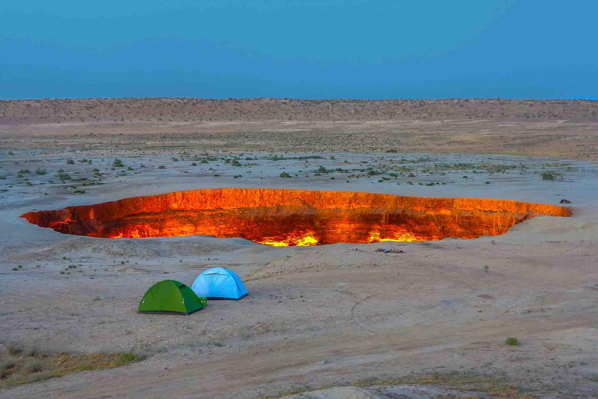 Visitors camp along the perimeter of the Gates of Hell. (AlexelA/Shutterstock)