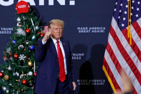 Former President and 2024 presidential hopeful Donald Trump gestures at the end of a campaign event in Waterloo, Iowa, on Dec. 19, 2023. (Kamil Krzaczynski/AFP via Getty Images)