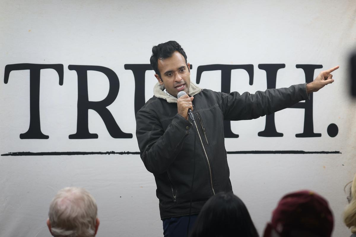 Republican presidential candidate businessman Vivek Ramaswamy speaks to guests during a campaign stop at AmericInn in Webster City, Iowa, on Dec. 19, 2023. (Scott Olson/Getty Images)