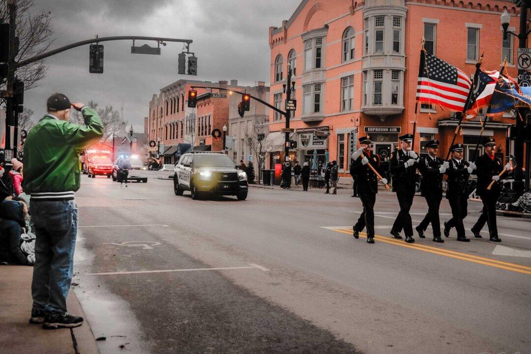 Ohio Photographer Captures Old Man Saluting US Flag at Christmas Parade—Tracks Him Down for a Talk