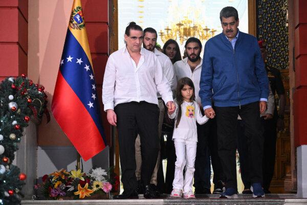 Colombian businessman Alex Saab (L) leaves after a meeting with Venezuela's President Nicolas Maduro (R) at the Miraflores Presidential Palace in Caracas on Dec. 20, 2023. (Federico Parra/AFP)