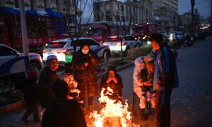 Cold Wave Freezes Much of China; Strained State Budgets Fail Earthquake Survivors