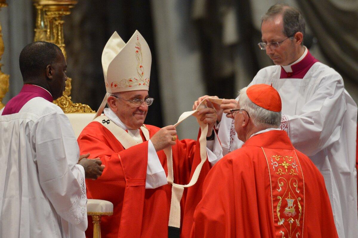 The then-new archbishop of Salzburg (Austria) Franz Lackner receives the Pallium from Pope Francis during a mass at St. Peter's basilica in Vatican on June 29, 2014. (Vincenzo Pinto/AFP via Getty Images)