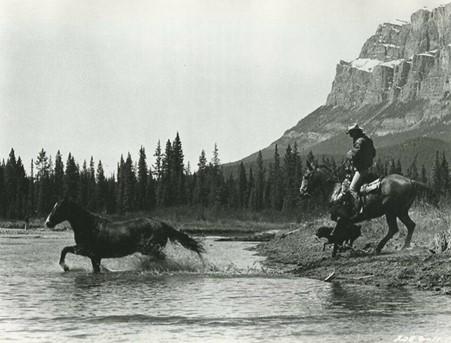 Dan (Joel McCrea) chases the wild mustang Shoshone, in “Mustang Country.” (Universal Pictures)