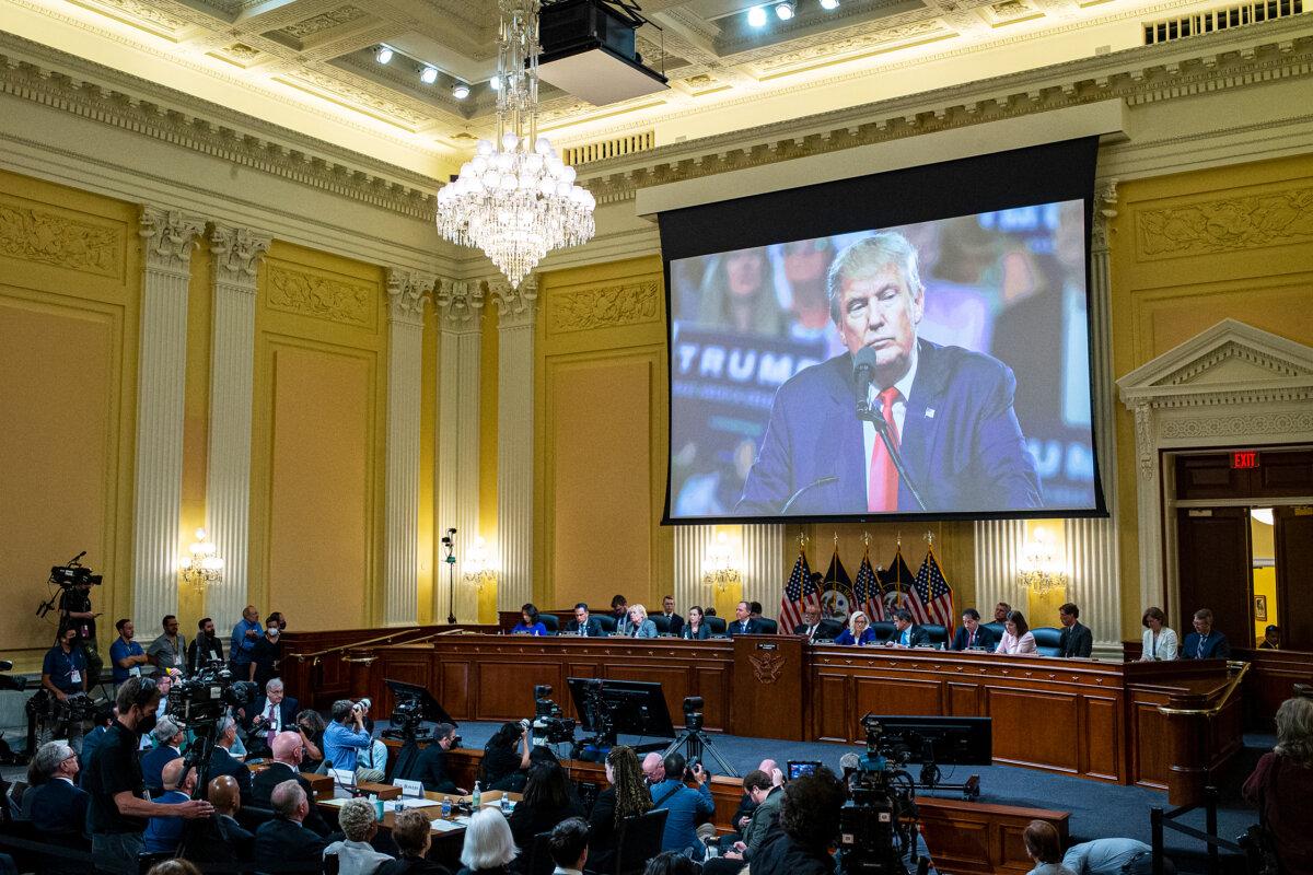 Former President Donald Trump is displayed on a screen during the fourth hearing on the January 6th investigation in the Cannon House Office Building in Washington on June 21, 2022. (Al Drago-Pool/Getty Images)