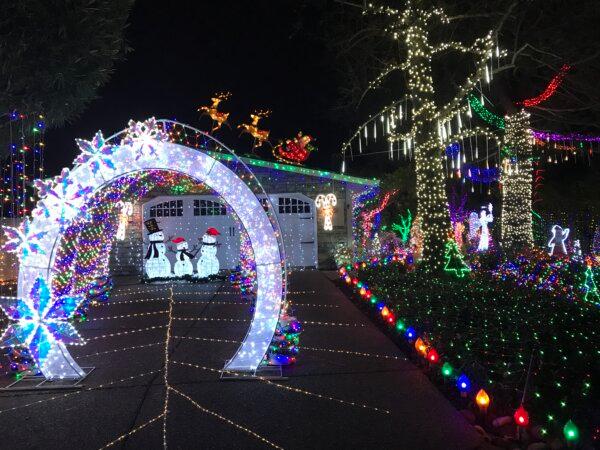 A tunnel made of lights at the home of Terri Perez, “The Christmas Lights Lady,” in Danville, Calif., on Dec. 19, 2023. (Helen Billings/The Epoch Times)