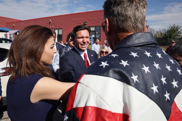 Republican presidential candidate Florida Gov. Ron DeSantis and his wife Casey DeSantis speak with guests following a campaign event in Cedar Rapids, Iowa, on Oct. 8, 2023. (Scott Olson/Getty Images)