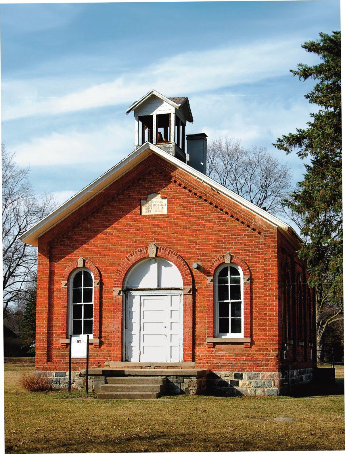 An iconic, red brick schoolhouse in Dixboro, Mich. (Susan Montgomery/Shuttersock)