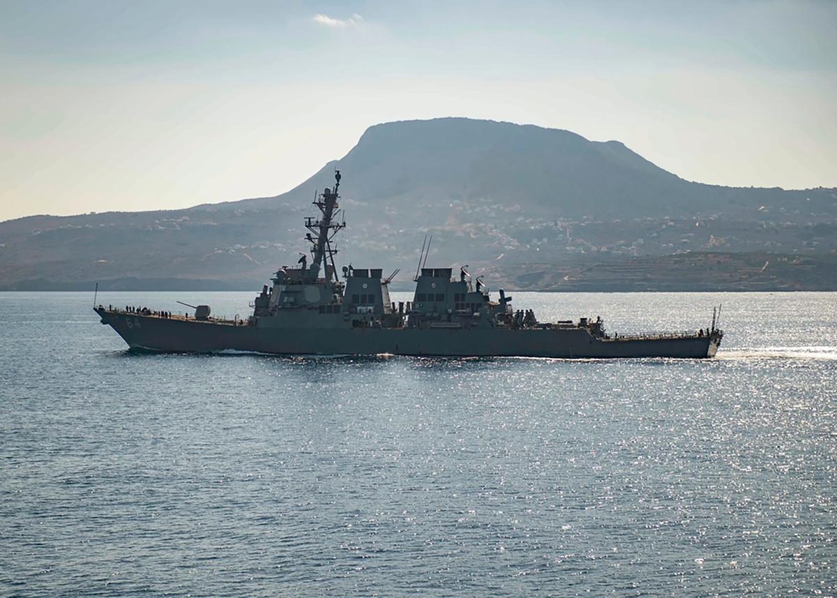 The guided-missile destroyer USS Carney in Souda Bay, Greece. The American warship and multiple commercial ships came under attack Sunday, Dec. 3, 2023, in the Red Sea, the Pentagon said. (Petty Officer 3rd Class Bill Dodge/U.S. Navy via AP)