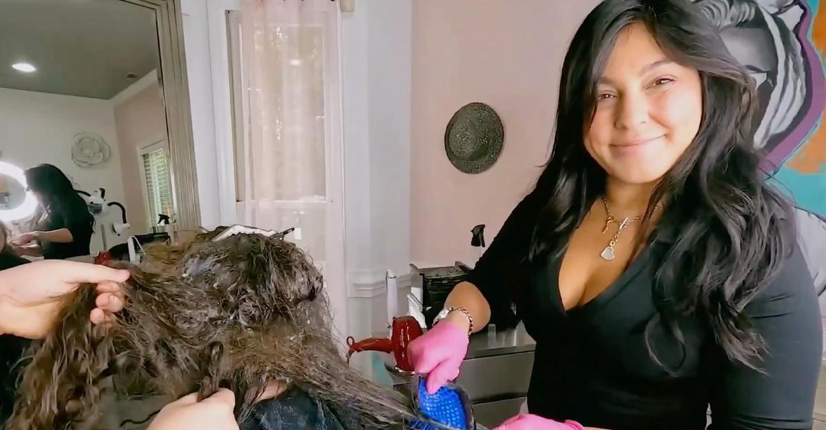 Leda Fazal working on Rebecca's severely matted hair.  (Courtesy of Leda Fazal/<a href="https://tonehairsalon.com/">Tone Hair Salon</a>)