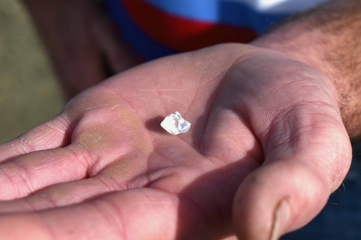 Mr. Evans holds what he thought was a piece of glass found at a state park last spring. (Courtesy of Crater of Diamonds State Park)