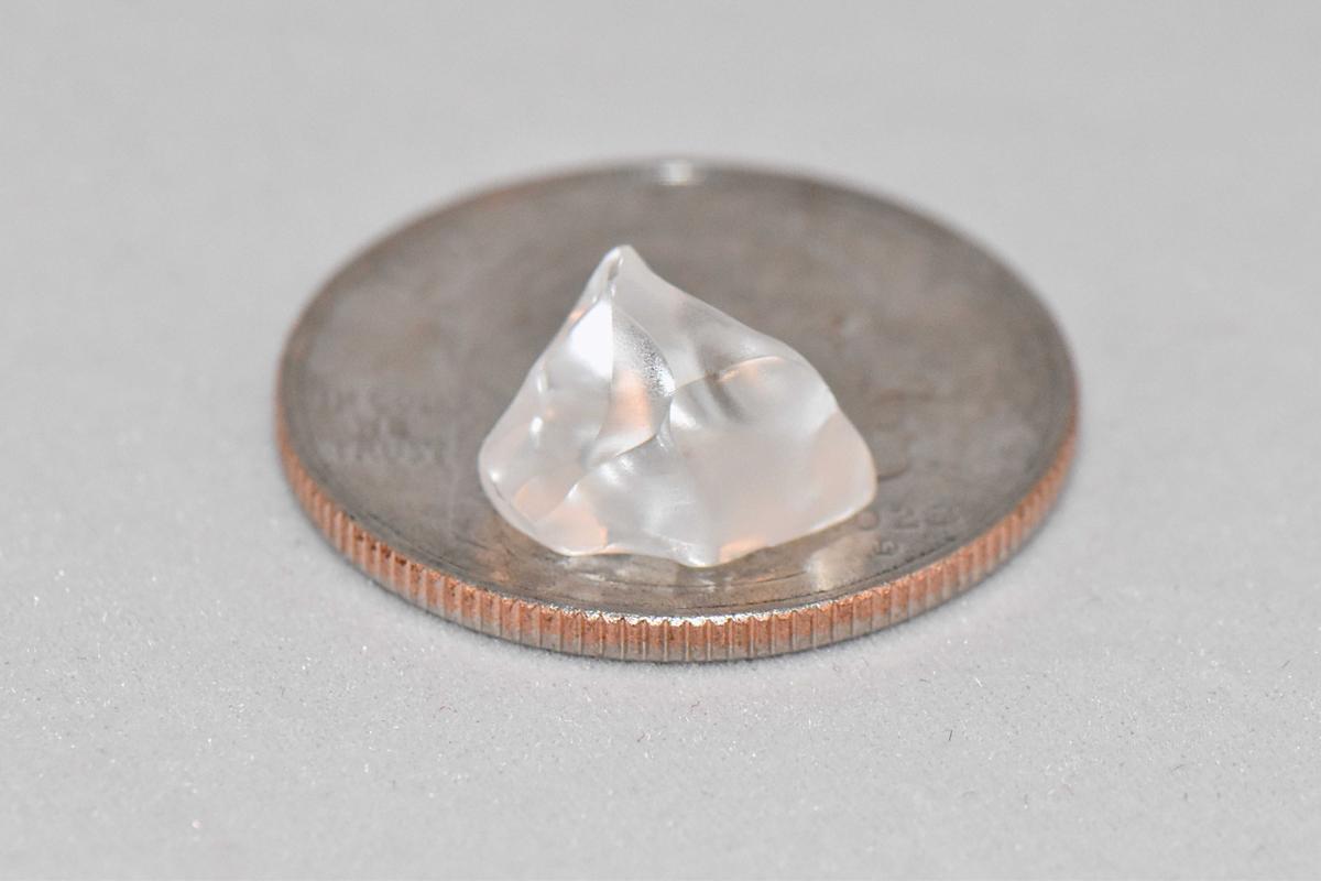The object is pyramidal and about the size of a jellybean. (Courtesy of Crater of Diamonds State Park)