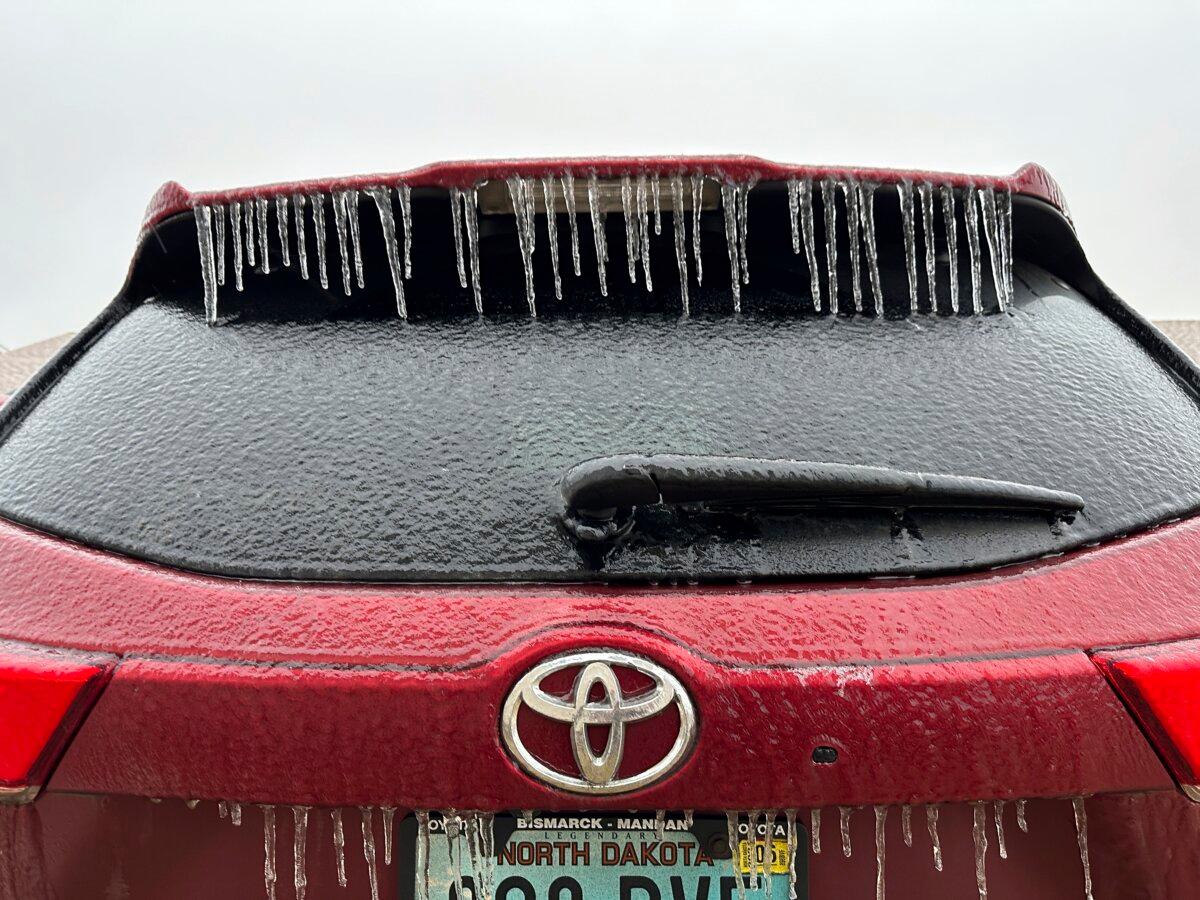 Ice coats a vehicle in Bismarck, N.D., on Dec. 26, 2023. (Jack Dura/AP Photo)