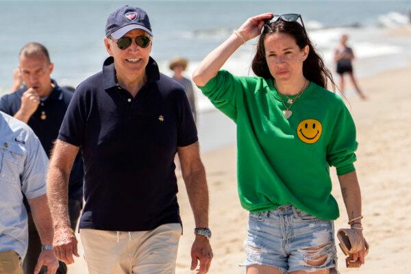 President Joe Biden walks on the beach with daughter Ashley Biden in Rehoboth Beach, Del., on June 20, 2022. (Manuel Balce Ceneta/AP Photo)