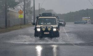 Queensland Cops a Soaking as Ex-cyclone Leaves Its Mark