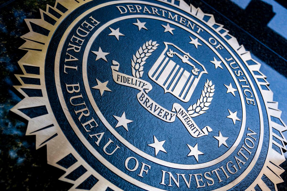 A "Department of Justice Federal Bureau of Investigation" seal is displayed on the J. Edgar Hoover FBI building in Washington on Aug. 9, 2022. (Stefani Reynolds/AFP via Getty Images)