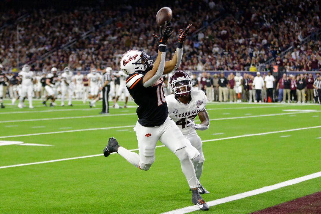 Owens, Presley Help No. 22 Oklahoma State Beat Texas A&M 31–23 in Texas Bowl