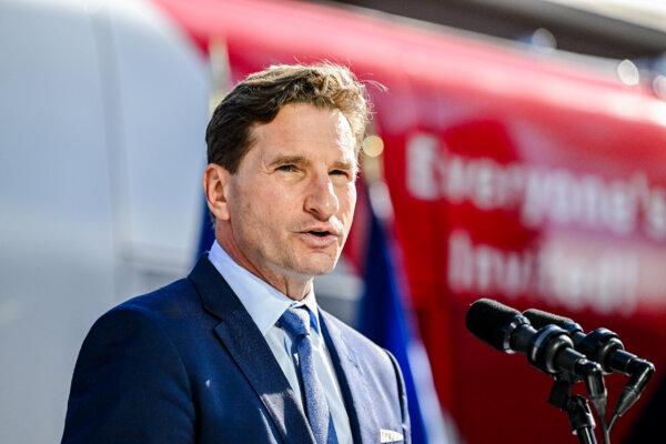 U.S. Rep. Dean Phillips (D-Minn.) holds a rally outside the N.H. Statehouse after handing over his declaration of candidacy form for president to the New Hampshire Secretary of State David Scanlan, in Concord, New Hampshire, on Oct. 27, 2023. (Gaelen Morse/Getty Images)