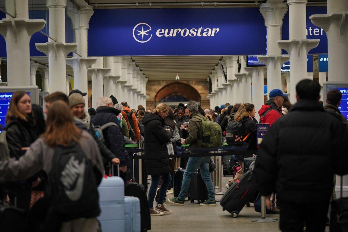 Passengers in line at the Eurostar terminal in St Pancras International station, central London, on Dec. 31, 2023. (Yui Mok/PA)