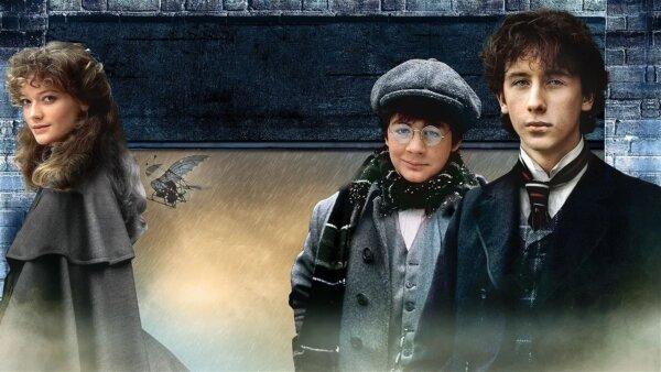 L–R) Elizabeth (Sophie Ward), John Watson (Alan Cox), and Sherlock Holmes (Nicholas Rowe), in “Young Sherlock Holmes.” (MovieStillsDB)