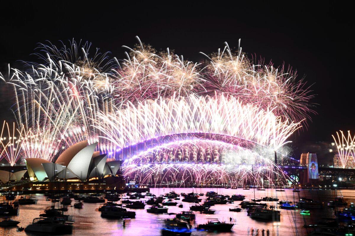  Fireworks explode over the Sydney Opera House and on the Harbour Bridge as part of New Year's Eve celebrations in Sydney on Jan. 1, 2024. (Dan Himbrechts/AAP Image via AP)