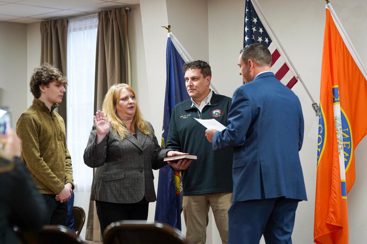 Keri Lee Carey was sworn in as Mount Hope town councilwoman by Orange County Executive Steve Neuhaus in Otisville, N.Y., on Dec. 31, 2023. (Cara Ding/The Epoch Times)