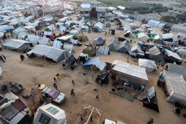 Displaced Palestinians, who fled their homes due to Israeli strikes, shelter in a tent camp, amid the ongoing conflict between Israel and Hamas, in Rafah, southern Gaza Strip, on Dec. 31, 2023. (Ibraheem Abu Mustafa/Reuters)