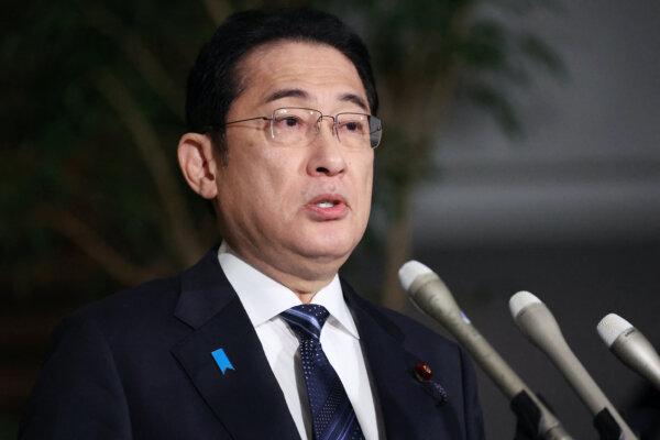 Japanese Prime Minister Fumio Kishida speaks to the media following a major earthquake and tsunami warning for the western coast of Japan at the prime minister's office in Tokyo, on Jan. 1, 2024. (Jiji Press/AFP via Getty Images)