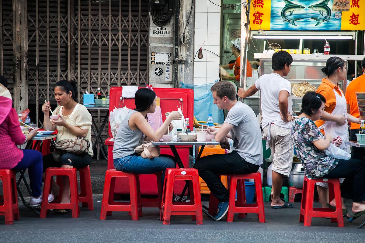 Chinatown has many streetside eateries that draw locals and tourists alike. (artapartment/Shutterstock)
