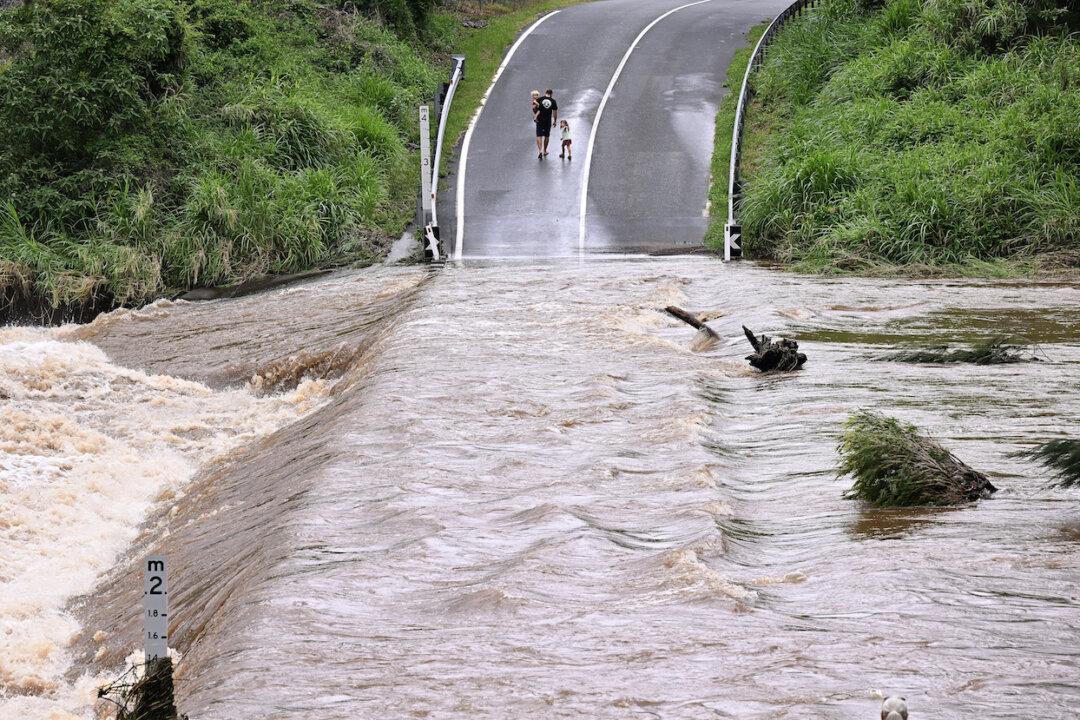 Flooding Damage Set to Be Assessed With Rain Easing