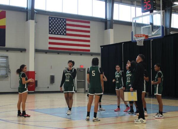 Coach DeAnthony Wiley instructs players before a high school basketball game at the Nike Tournament of Champions in Mesa, Arizona the week before Christmas 2023. (Courtesy of Brenda Bermudez)
