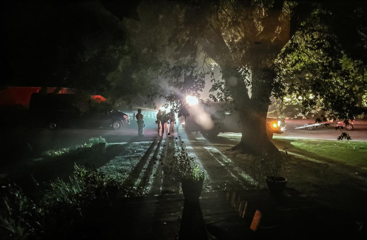 Dozens of heavily armed FBI agents conduct a predawn raid on the home of Robert and Rosemarie Westbury in Lindstrom, Minn., on Oct. 4, 2021. (Courtesy of the Westbury Family)