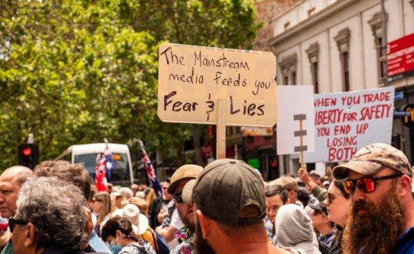 Protestors in Sydney, Australia speak up against media misinformation. (James Cole Creative/Shutterstock)