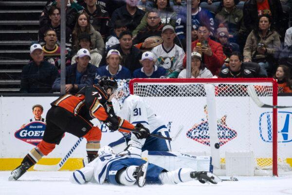 Anaheim Ducks right wing Frank Vatrano (77) scores a goal past Toronto Maple Leafs goaltender Martin Jones (31) during the second period of an NHL hockey game in Anaheim, Calif, on Jan. 3, 2024. (Kyusung Gong/AP Photo)