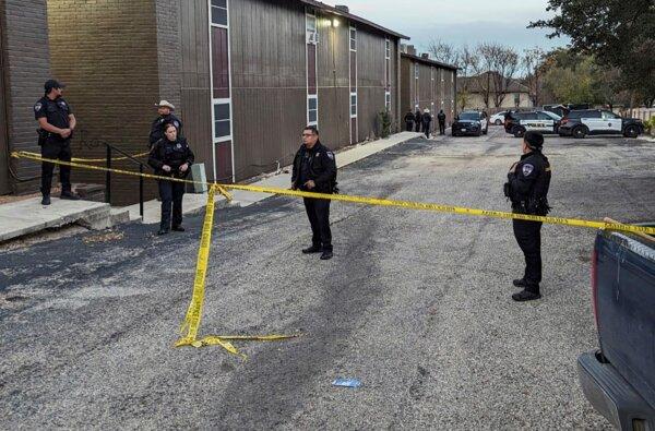 Police rope off the scene where two dead bodies were discovered in San Antonio, Texas, on Dec. 26, 2023. (Jacob Beltran/The San Antonio Express-News via AP)