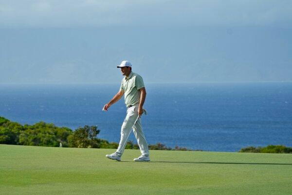 Scottie Scheffler walks off the 14th green during the first round of The Sentry golf event in Kapalua, Hawaii, on Jan. 4, 2024. (Matt York/AP Photo)
